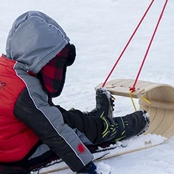 A Kid Sleighing